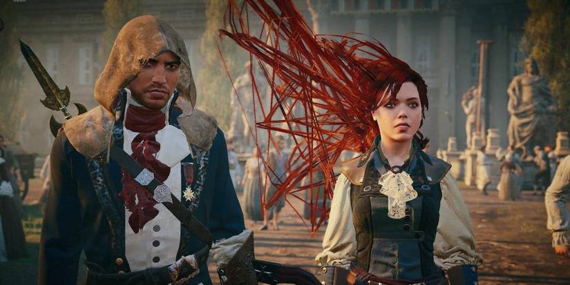 Arno y Elise juntos en Unity, con el pelo de Elise deformado en mechones rojos angulosos por un fallo de renderizado