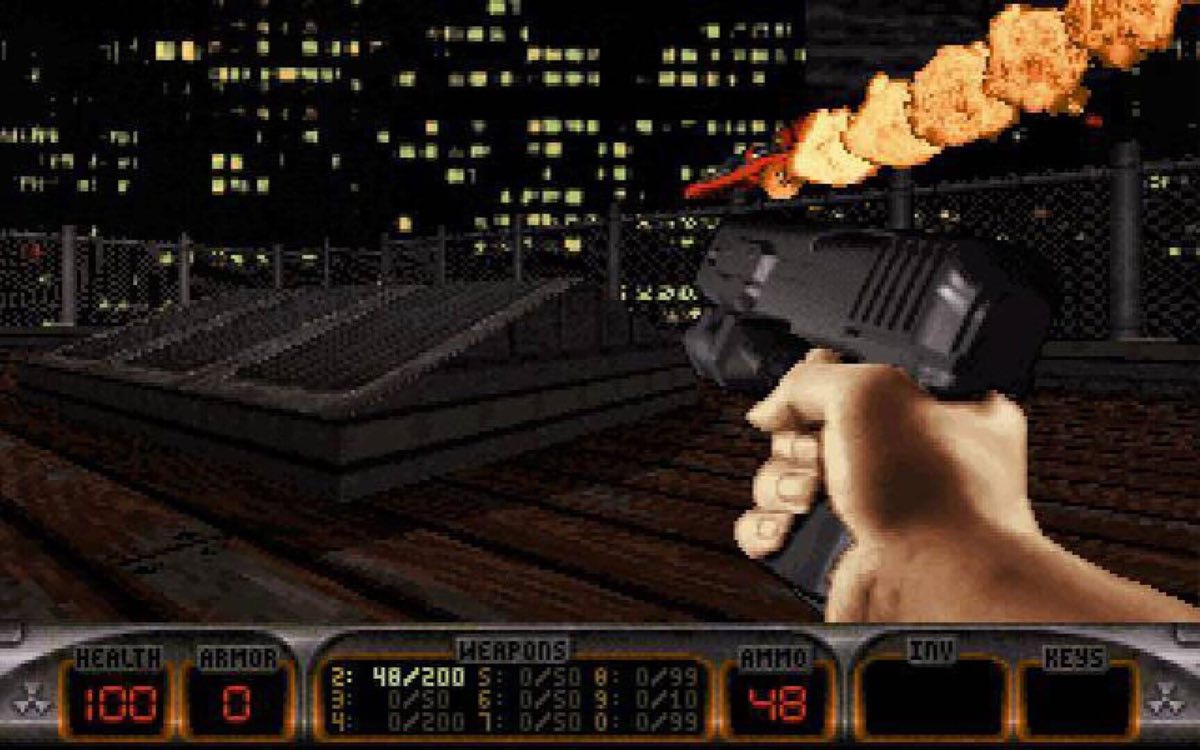 Capture d'écran de Duke Nukem 3D, Duke armé sur un toit new-yorkais de nuit