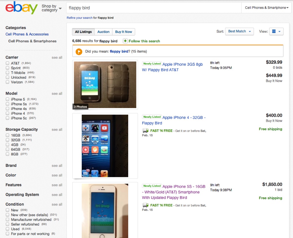 Screenshot of eBay search results for 'flappy bird' on February 10, 2014, showing iPhones resold with the game preinstalled