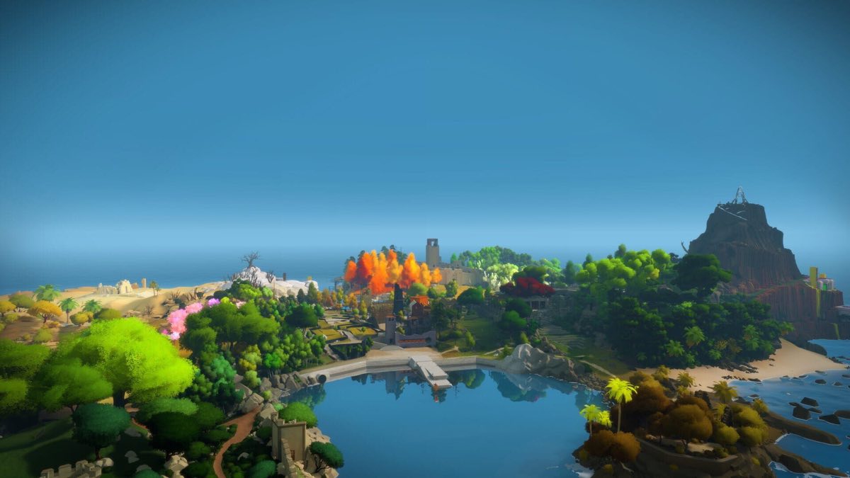 Panoramablick auf die farbenfrohe Insel aus The Witness mit ihren Bäumen und Steinruinen